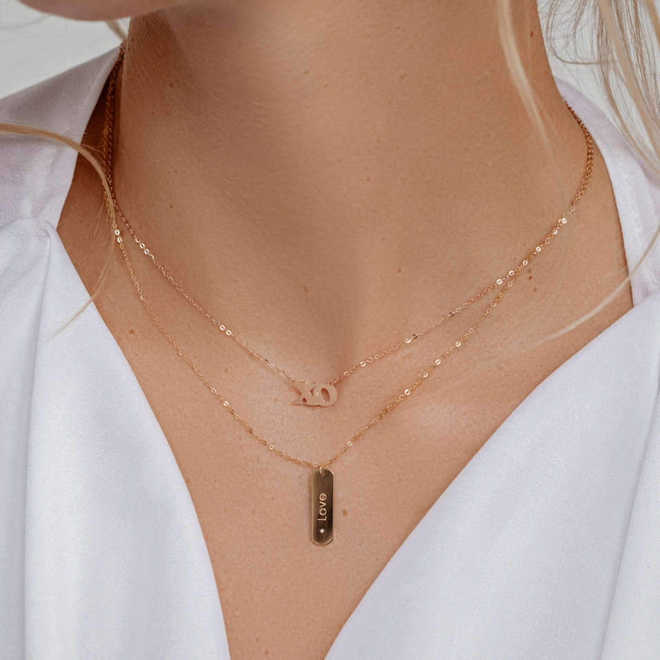 Náhrdelník s diamantom XO